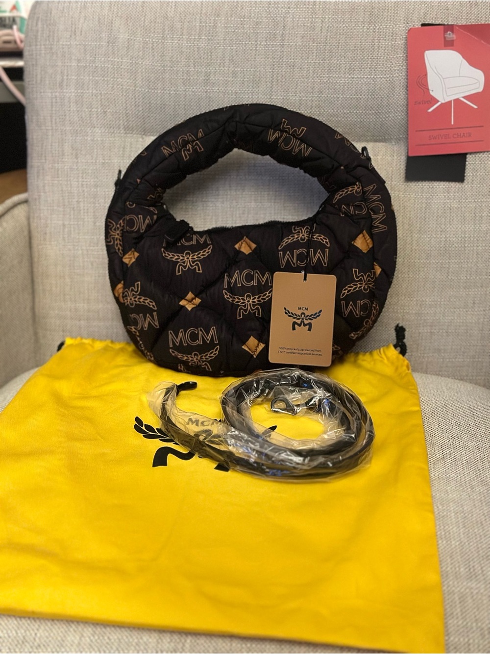 MCM Black Quilted Logo Puffer Crossbody Bag with Gold Accents
